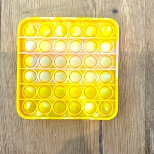 Yellow and pink square pop it tye dye